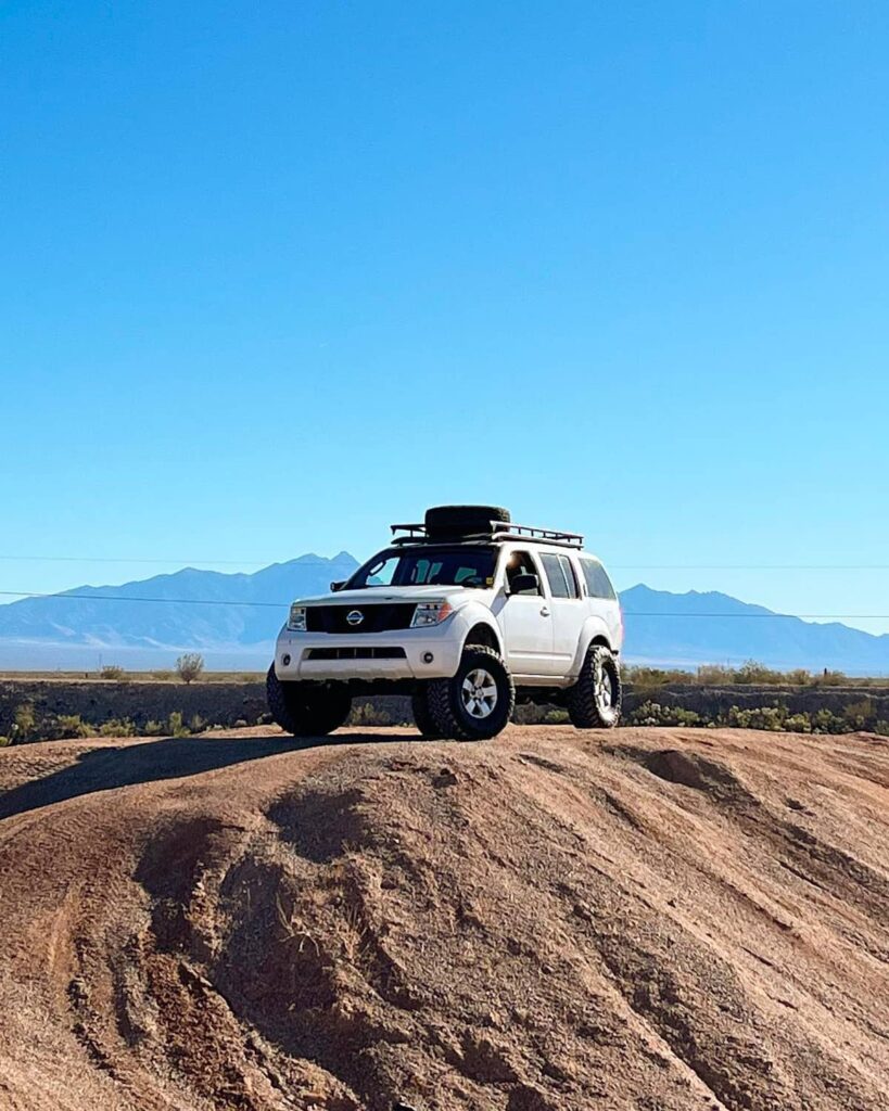 Off roading in a Lifted Nissan Patfinder 4rd generation