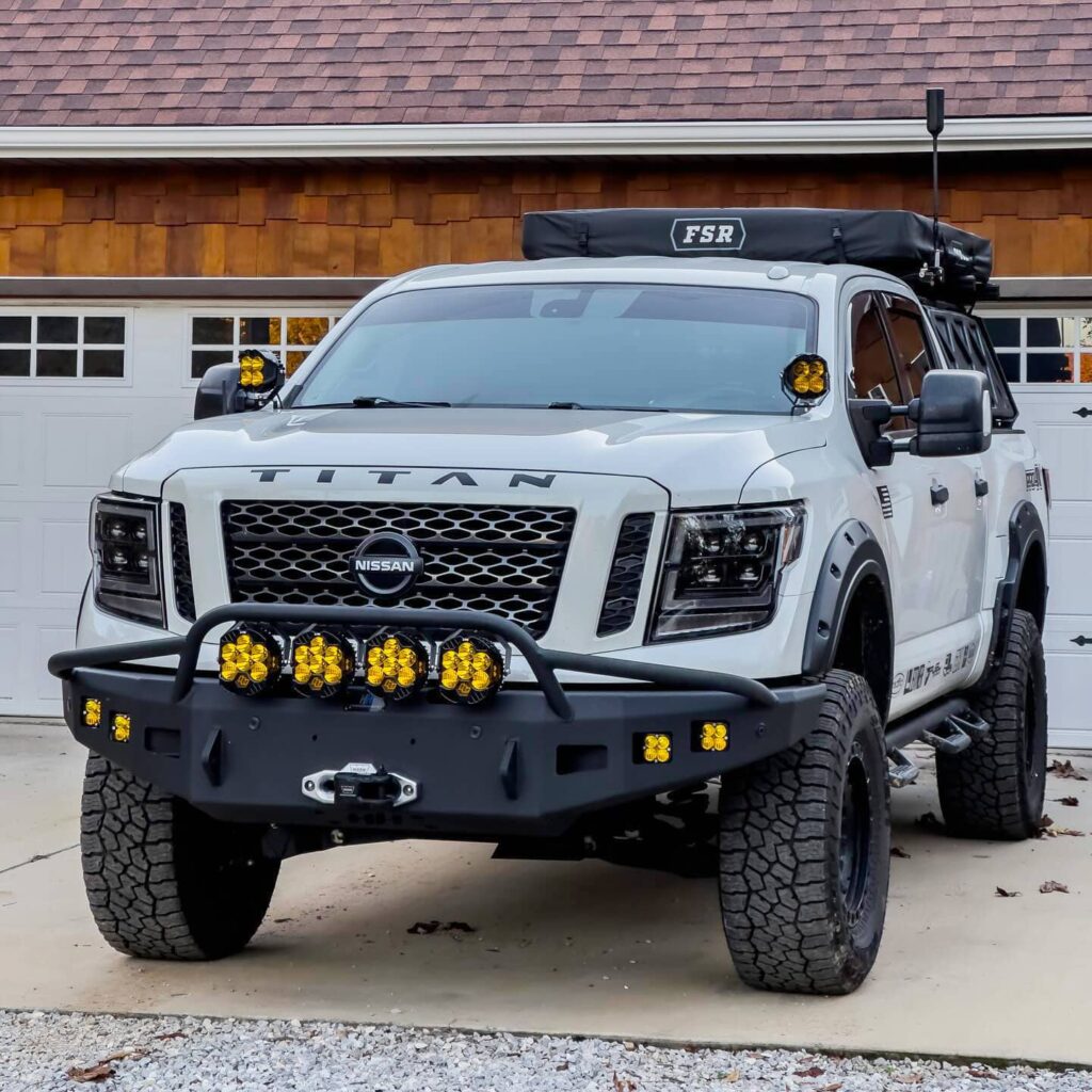 Titan Pro4X lifted with Radflo 6″ Coilovers, DK Ball Joint Upper Control Arms, DK Ball Joint Caps, CJD Lower Control Arms, Full Heim Steering Tie Rods and sitting on 35" tires