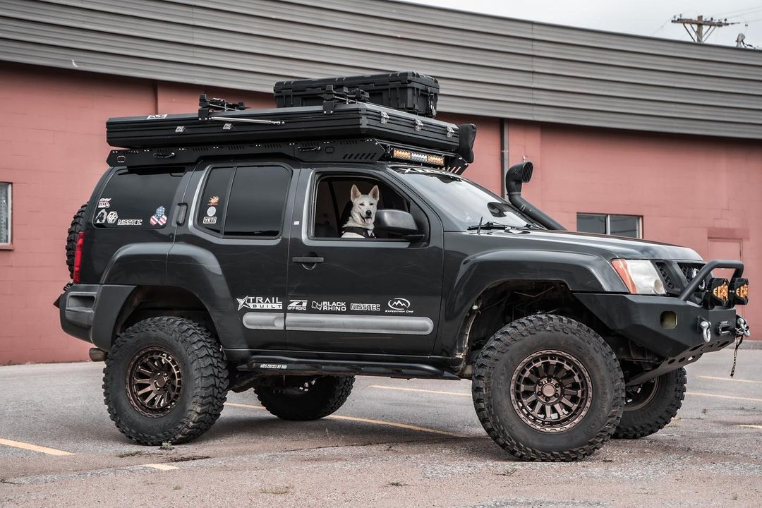 Nissan Xterra overland build with roof top cargo boxes.