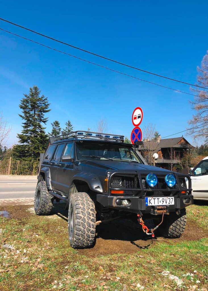 Jeep Cherokee XJ with off-road bumper and winch in Poland mountains