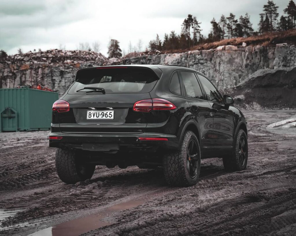 Lifted 2010 Porsche Caynne with custom cut rear off-road bumper