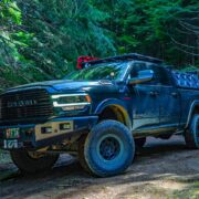 Offroading in the forest trails on a lifted Ram 2500 diesel overlander