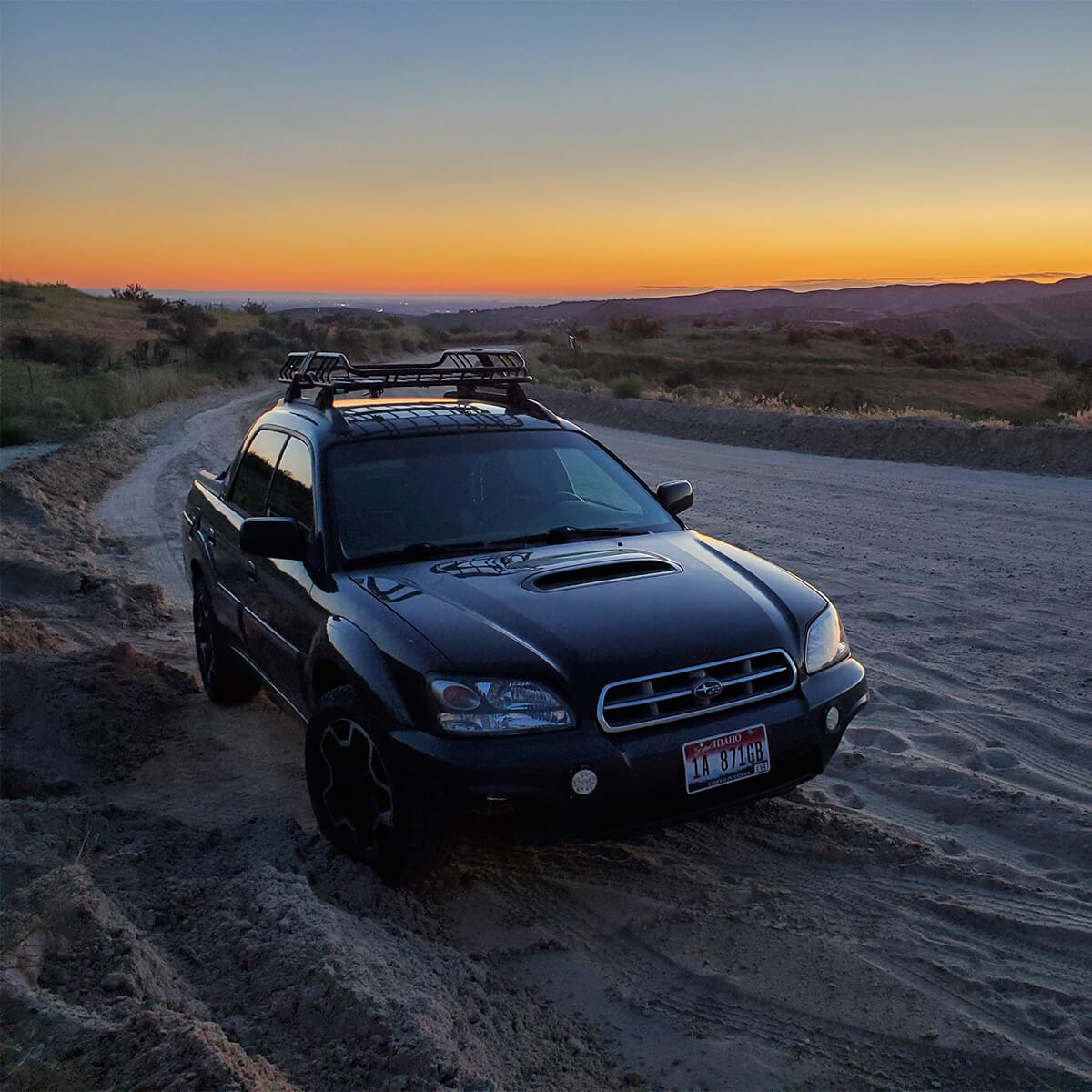 Subaru Baja black with Off-road wheels