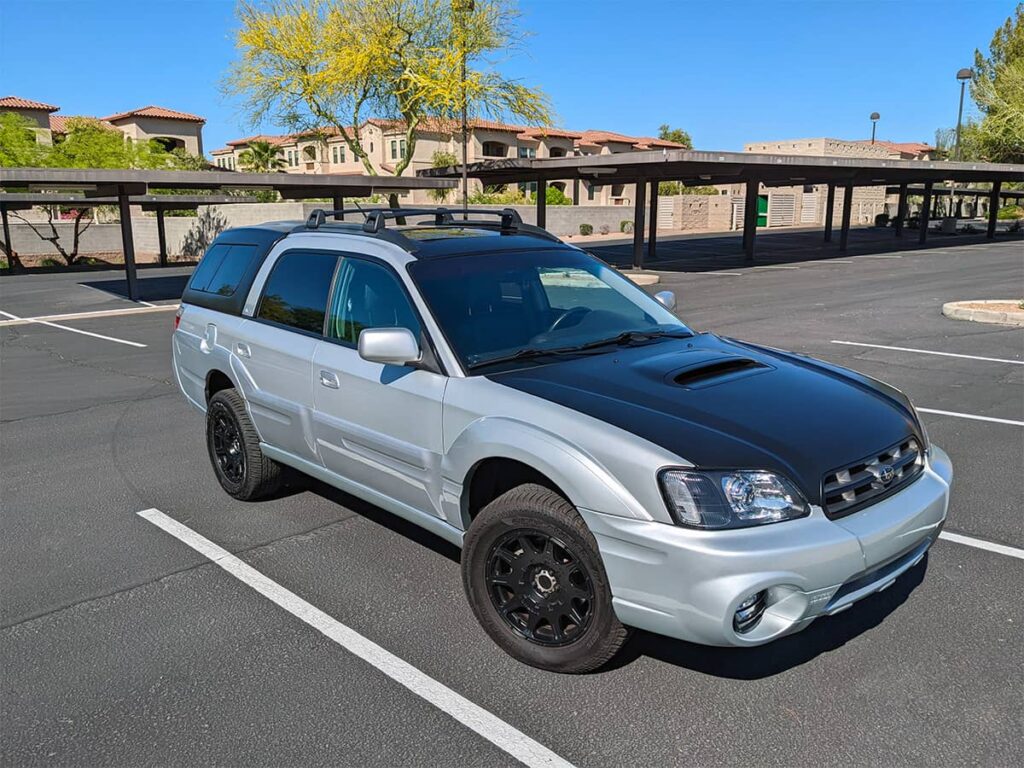 Super Clean Subaru Baja truck with A.R.E. Camper Shell and Low Miles