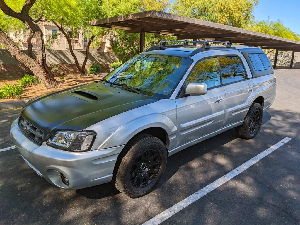 Super Clean Subaru Baja truck with A.R.E. Camper Shell and Low Miles