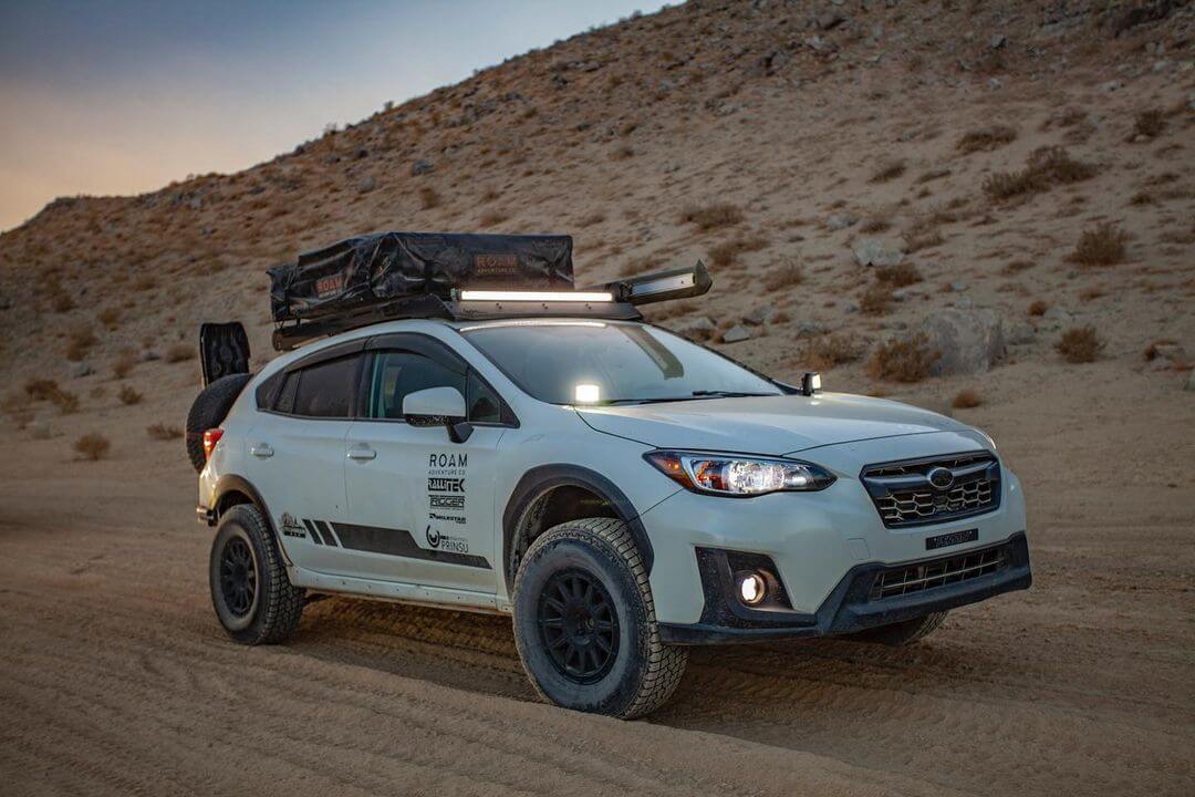 Lifted Subaru Crosstreck offroading in the sand