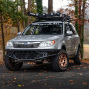 Silver Subaru Forester With off-road modifications