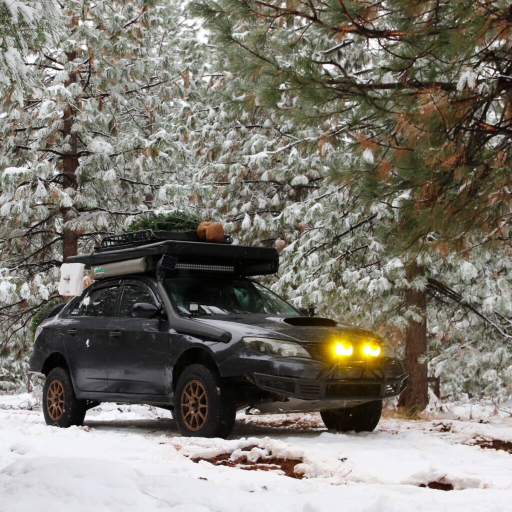 Subaru Impreza with yellow off-road driving lights round