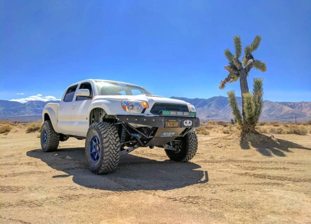 White Toyota Tacoma baja prerunner truck for desert racing