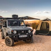 Lifted Suzuki Jimny camping in African Desert