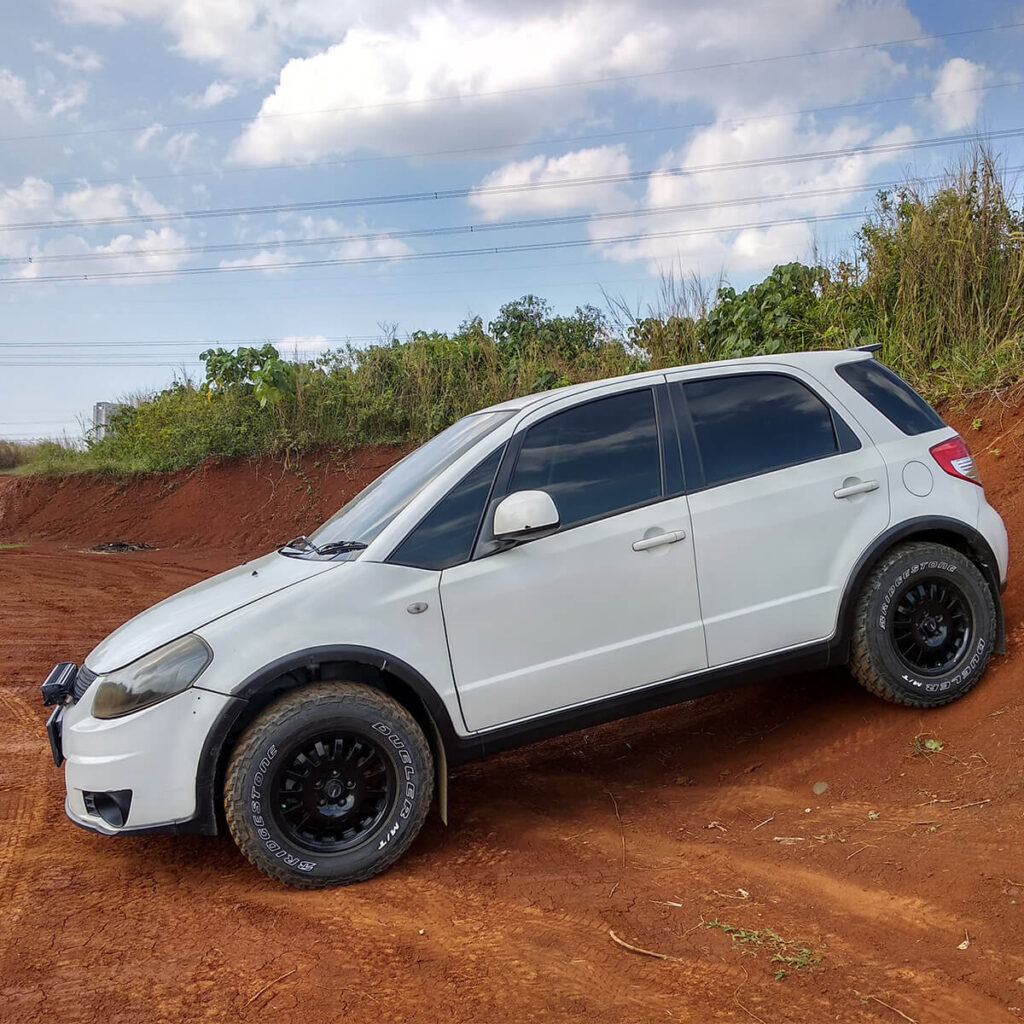 Lifted Suzuki SX4 With Offroad Tires the Evolution From Rally to