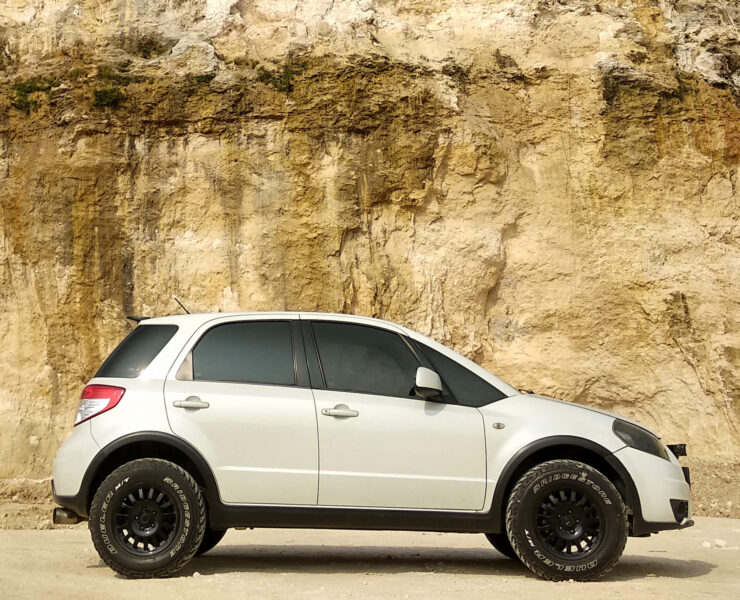 Lifted Suzuki SX4 With off-road wheels