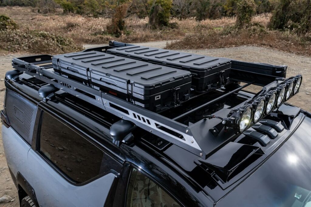 full-length roof rack with a KC HiLites LED light bar, Rhino Rack Batwing awning