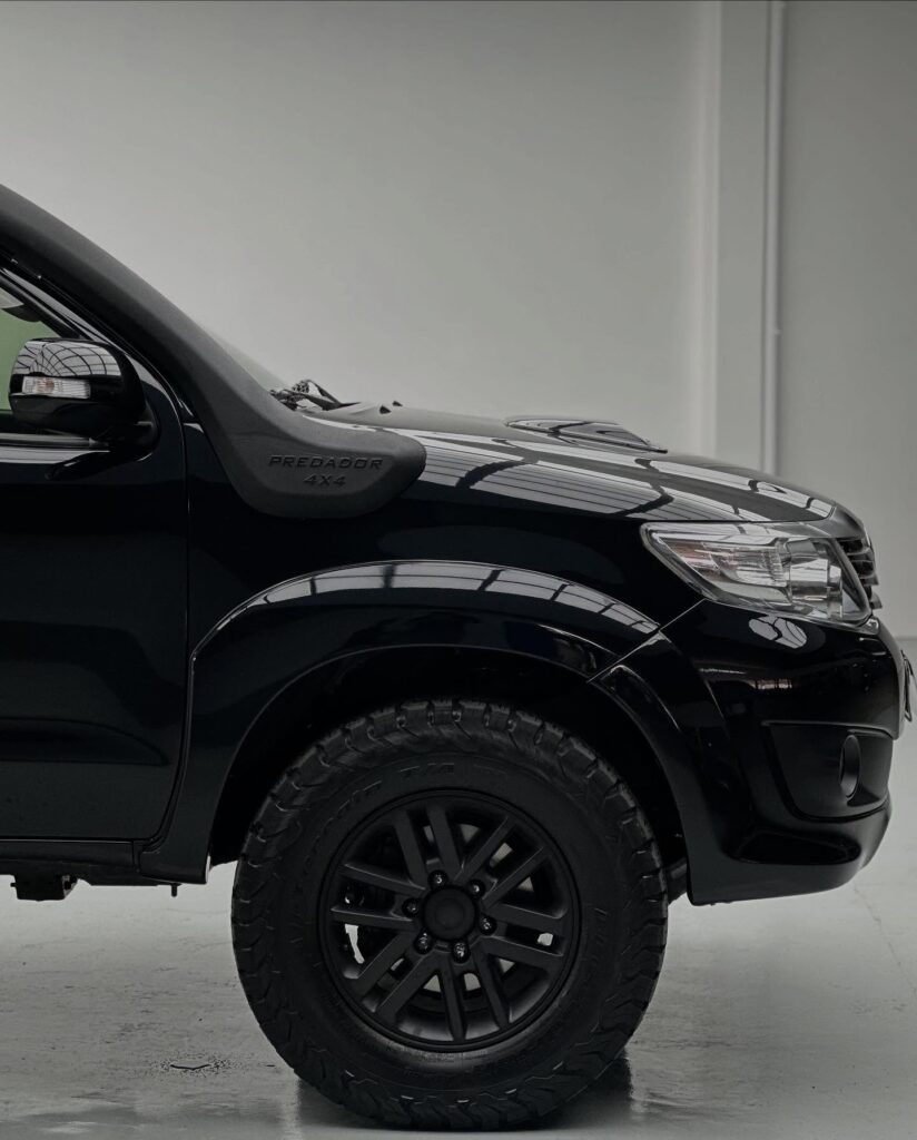 Black 2015 Toyota Fortuner on 33" off road wheels and tires