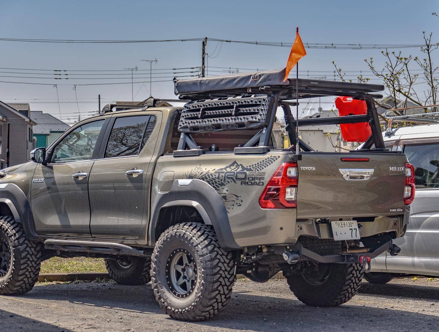 Toyota Hilux with a bed rack and Roof top tent for overlanding