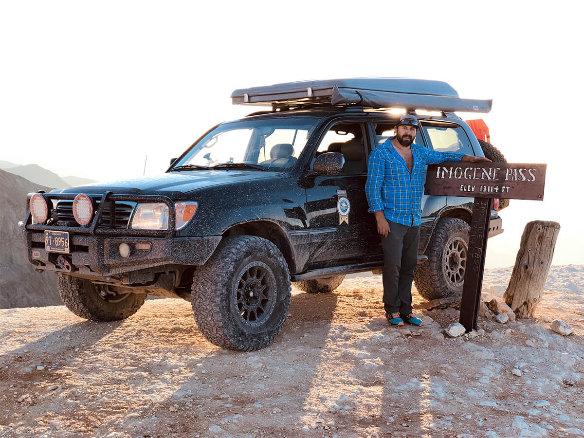 Black toyota land cruiser 100 with a 3 inch lift