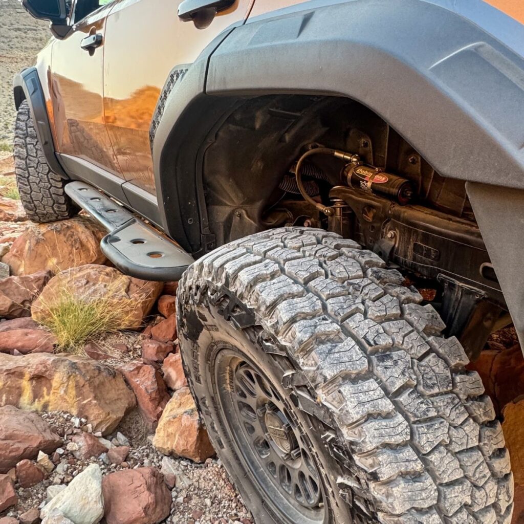 Custom fabricated rock sliders and Dobinsons MRR extended travel 3" lift kit