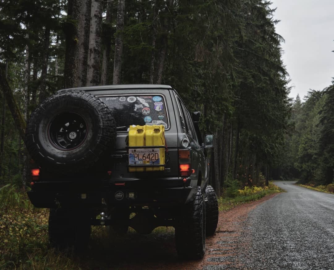 37x12.50R17 Goodyear Wrangler MTR/K spare tire mounted on the rear door of a lifted LC60