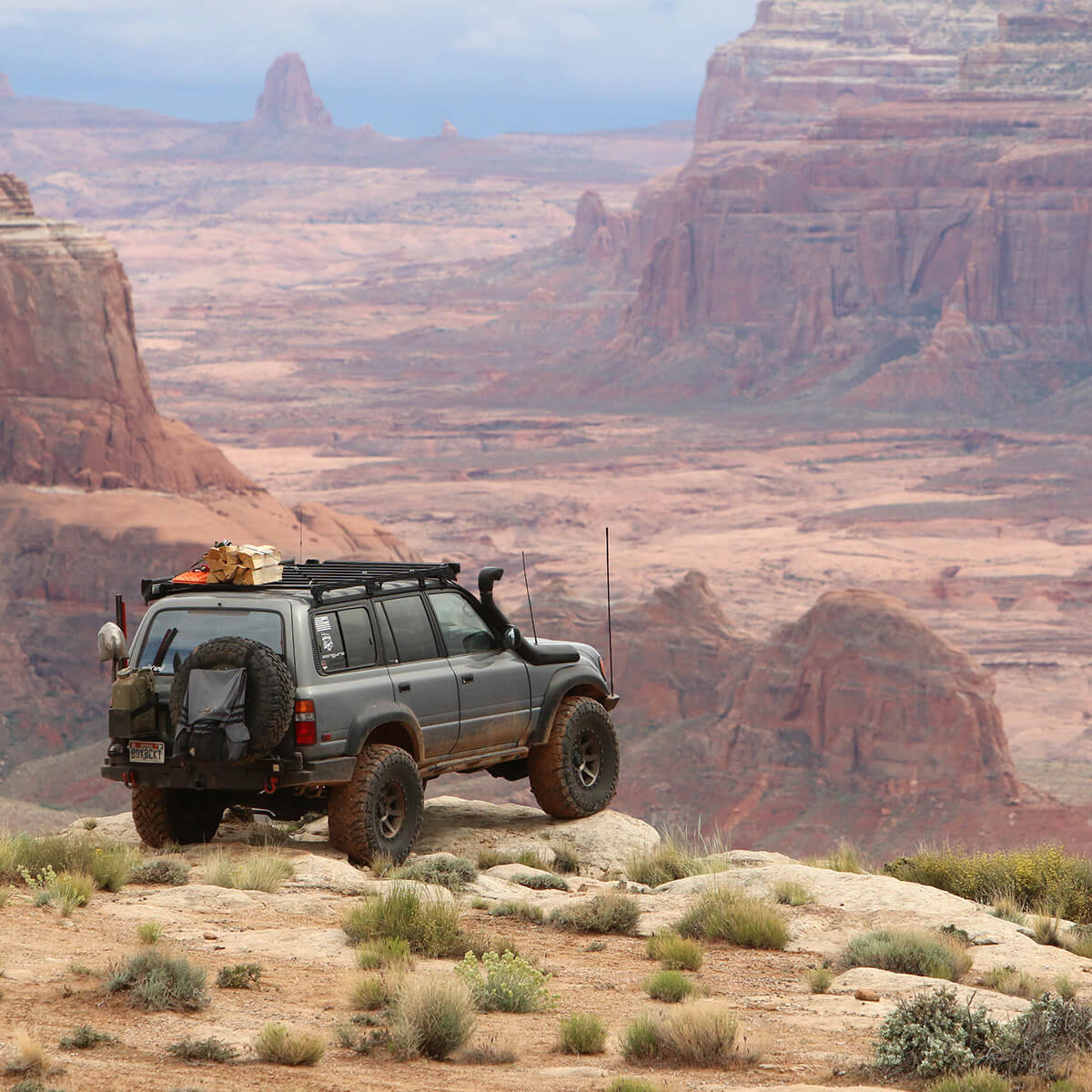 Toyota Land Cruiser 80 off-roading during overland trip into the mountains