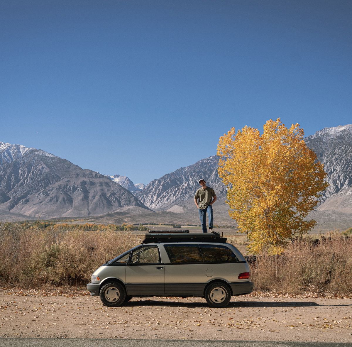 Yakima Road Shower mounted on a Toyota Previa roof rack near Mammoth CA with fall foliage