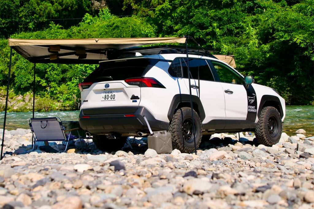 Off road camping in a lifted Toyota Rav4 on rocky terrain