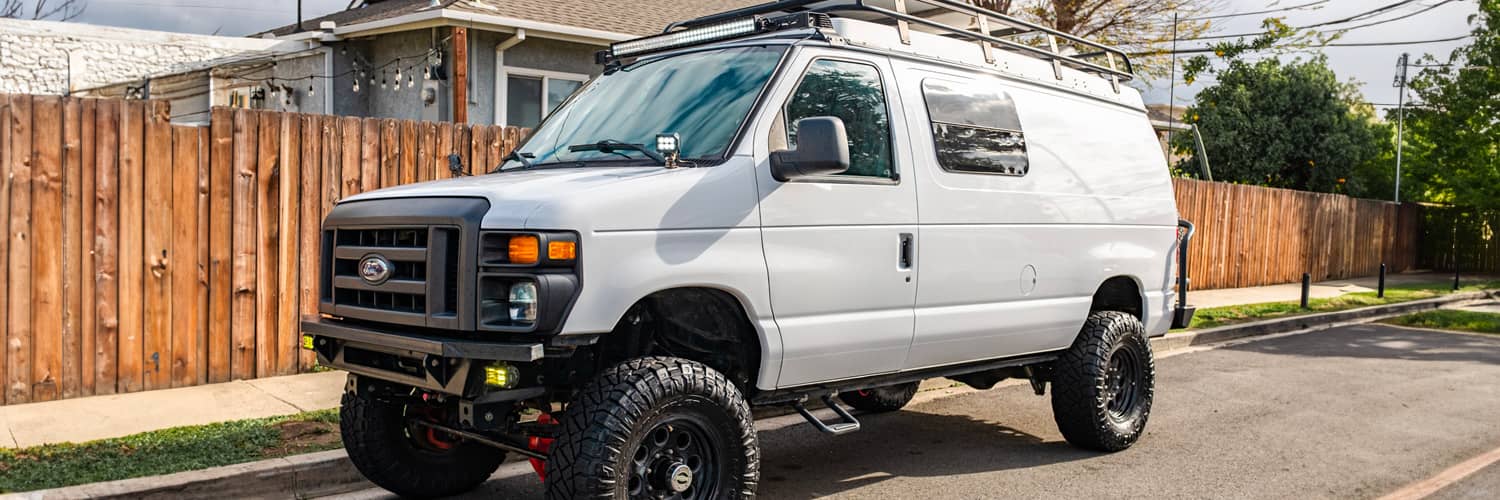 Off road van builds with lifts and oversized tires