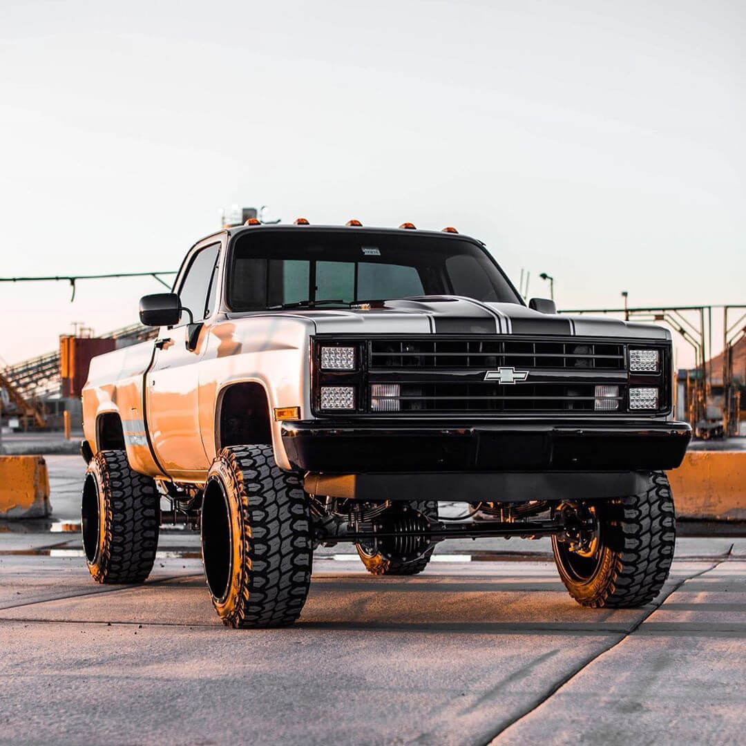 lifted Chevy C/K 10 with LED headlights