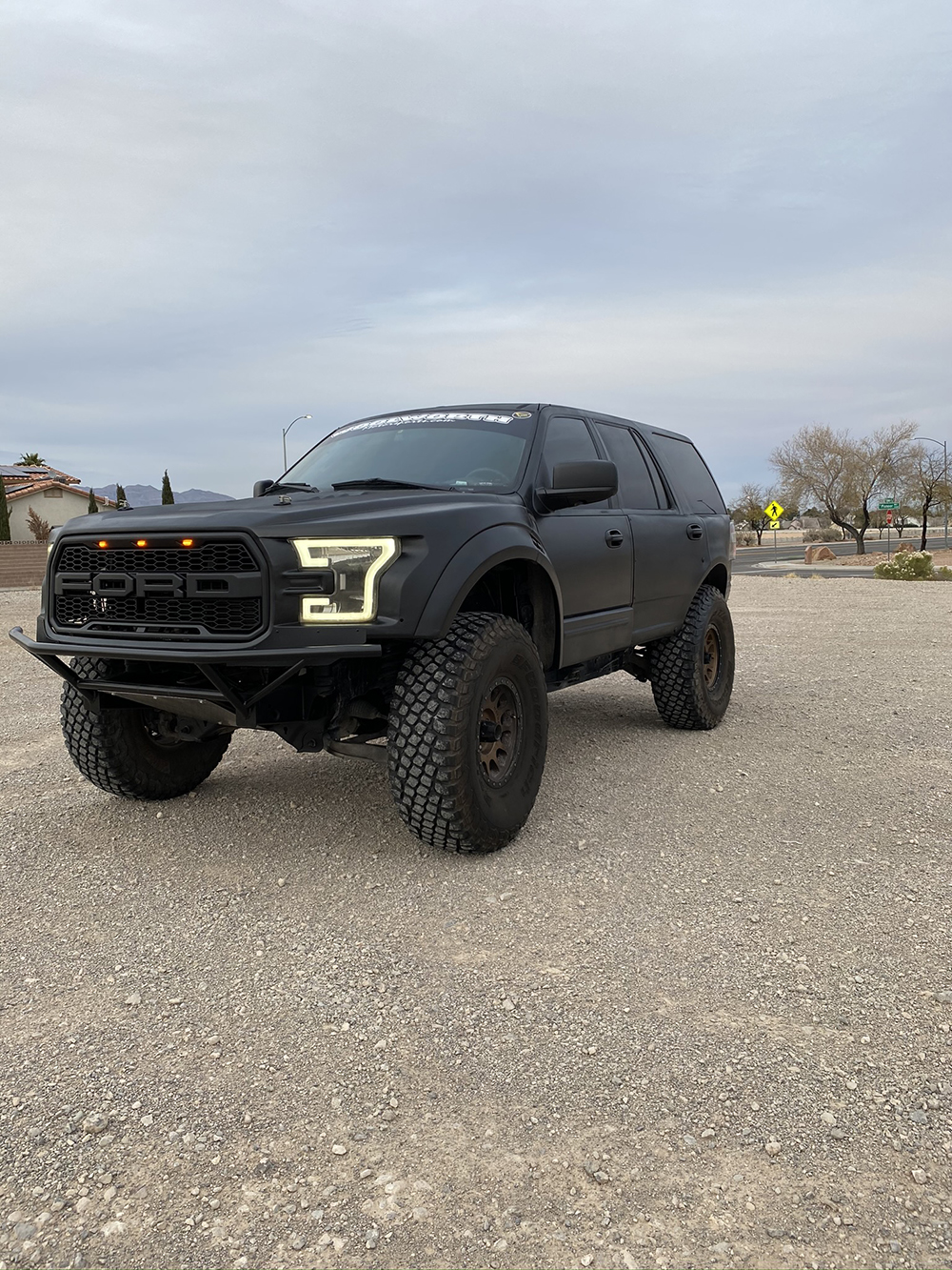 Lifted Lifted Ford Expedition With Raptor fiberglass conversion front end