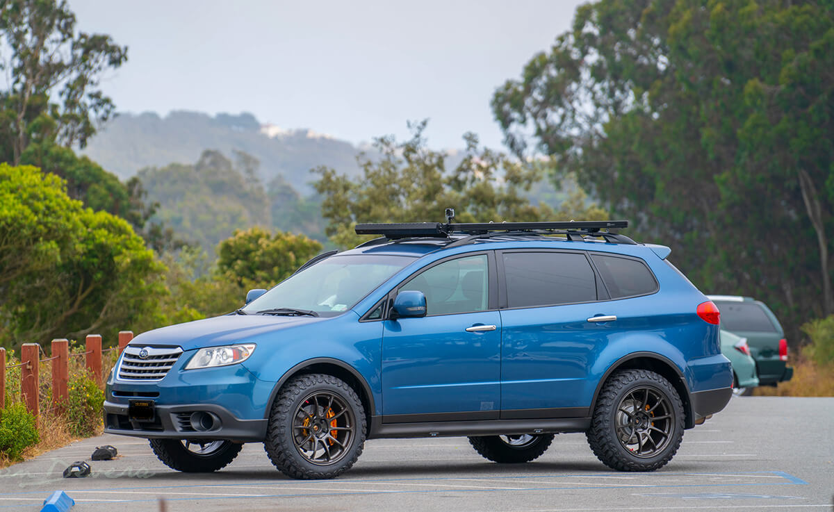 Lifted Subaru tribeca FrontRunner Outfitters Slimline II Roof rack with stainless steel tie downs