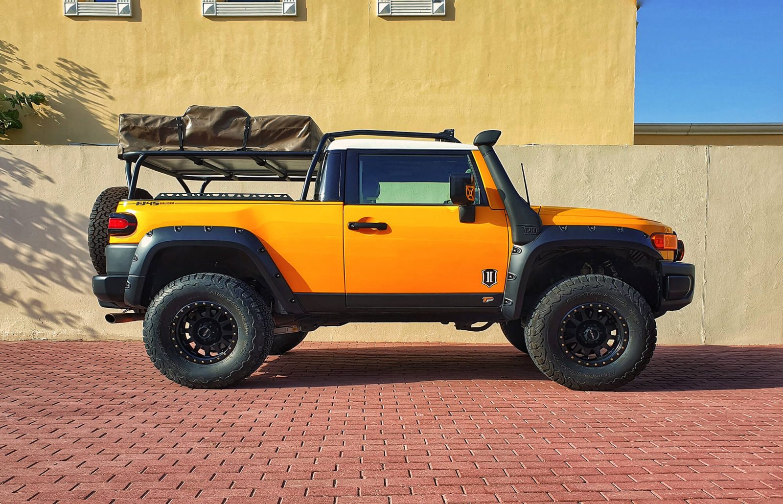 Lifted Toyota FJ Cruiser pickup truck conversion