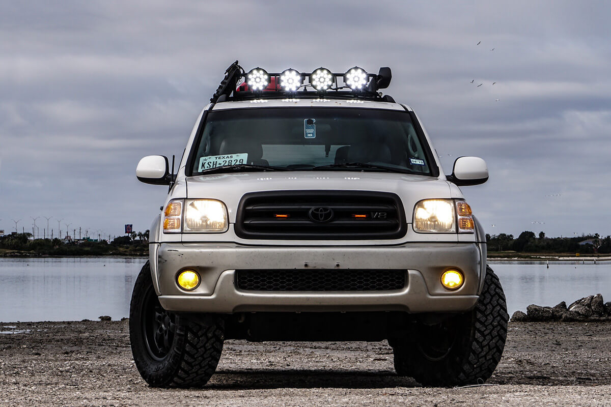 Round LED lights mounted on a cargo basket / Roof Rack