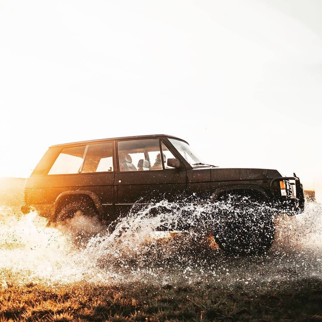 Offroading in a classic Range Rover suv