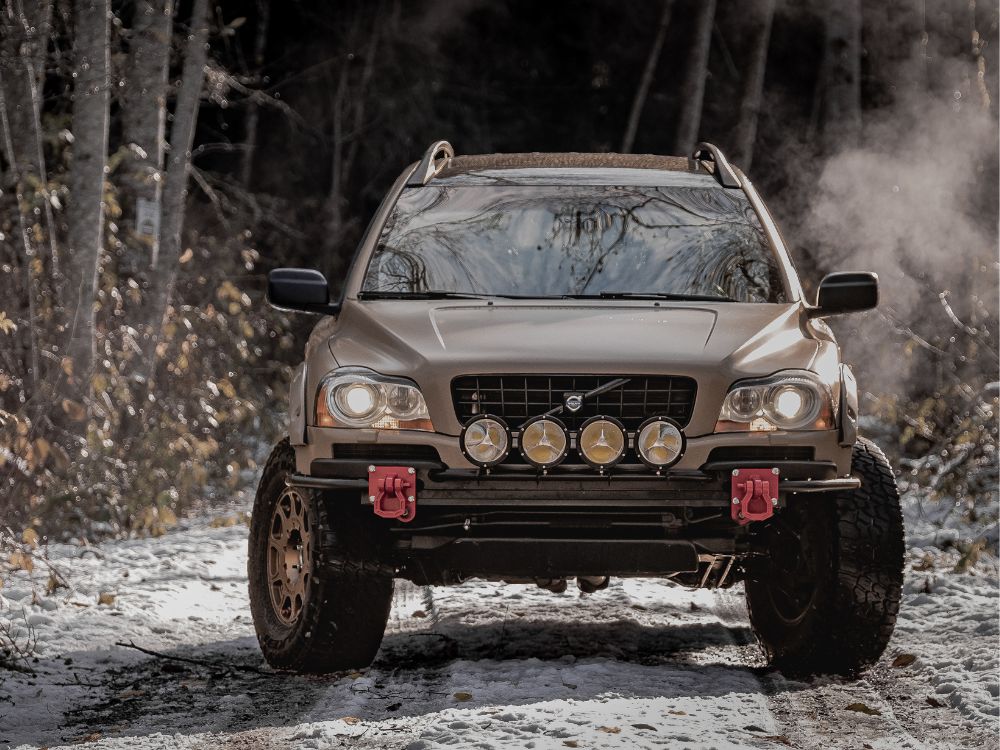 Volvo XC90 with custom offroad bumper and round driving lights