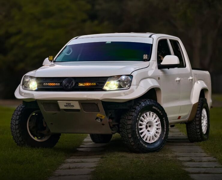 2020 Volkswagen Amarok in white with custom tubular front bumper and Baja Designs auxiliary lights