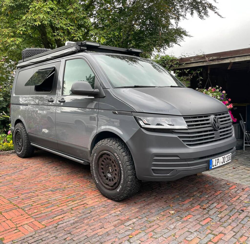 Lifted Volkswagen Transporter T6 off road overland van with rhino rack sunseeker awning